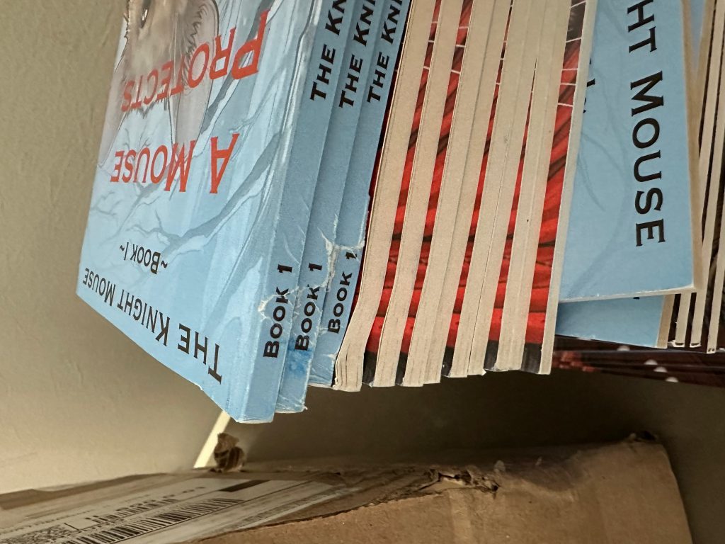 Spine damage to a number of Knight Mouse Book 1 books.